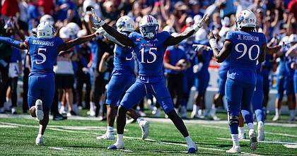 Kansas linebacker Craig Young (15) and the defense celebrate a missed Iowa State field goal attempt during the first quarter on Saturday, Oct. 1, 2022 at Memorial Stadium.