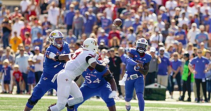 Kansas quarterback Jalon Daniels (6) throws to a receiver during the first quarter against Iowa State on Saturday, Oct. 1, 2022 at Memorial Stadium.