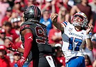 Kansas quarterback Jason Bean (17) passes the ball against Oklahoma during the second half of an NCAA college football game Saturday, Oct. 15, 2022, in Norman, Okla. Oklahoma won 52-42. (AP Photo/Alonzo Adams)