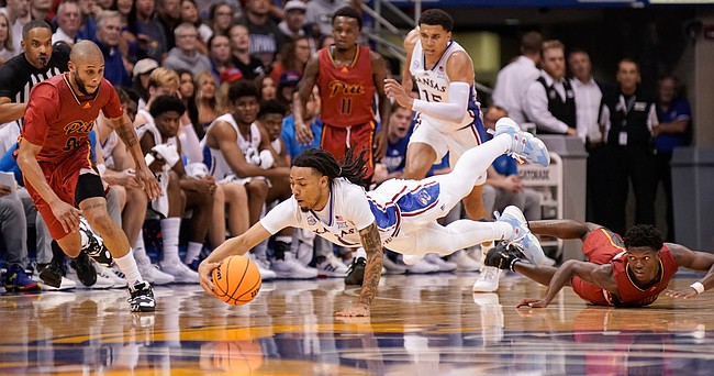 Kansas guard Bobby Pettiford Jr. (0) lays out for a loose-ball steal against Pittsburg State during the first half of an exhibition on Thursday, Nov. 3, 2022 at Allen Fieldhouse.