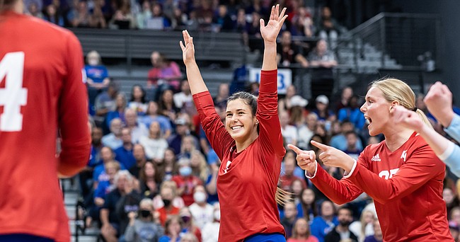 Kansas volleyball libero Kennedy Farris, a junior from Lansing, throws her arms up to celebrate a point during the Jayhawks' three-set sweep of Kansas State on Wednesday, Nov. 2, 2022, at Horejsi Family Volleyball Arena. 