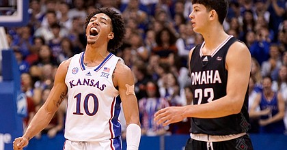 Kansas forward Jalen Wilson (10) celebrates a three next to Omaha forward Frankie Fidler (23) during the first half, Monday, Nov. 7, 2022 at Allen Fieldhouse.