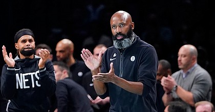 Brooklyn Nets head coach Jacque Vaughn claps for his team during the first half of an NBA basketball game against the New York Knicks, Wednesday, Nov. 9, 2022, in New York. (AP Photo/Frank Franklin II)


