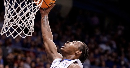 Kansas guard MJ Rice (11) gets up for a put-back bucket against North Dakota State during the first half, Thursday, Nov. 10, 2022 at Allen Fieldhouse.