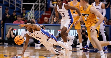 Kansas guard Joseph Yesufu (1) lays out on the floor for a loose ball against North Dakota State during the second half, Thursday, Nov. 10, 2022 at Allen Fieldhouse.