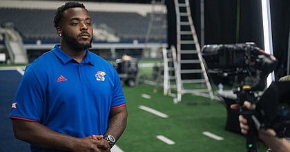 Kansas defensive lineman Caleb Sampson films a commercial for the Big 12 Champions for Life campaign last summer. Sampson was chosen for the project to represent all of KU student-athletes.