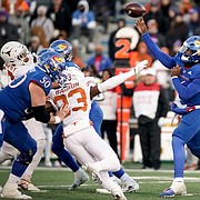 Kansas quarterback Jalon Daniels (6) heaves a pass up the field against Texas during the third quarter on Saturday, Nov. 19, 2022 at Memorial Stadium.