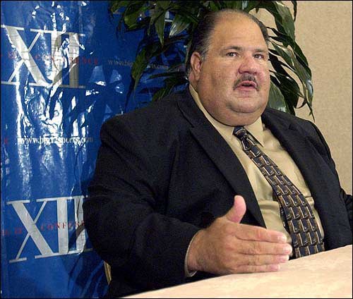 Mark Mangino through the years | KUsports.com