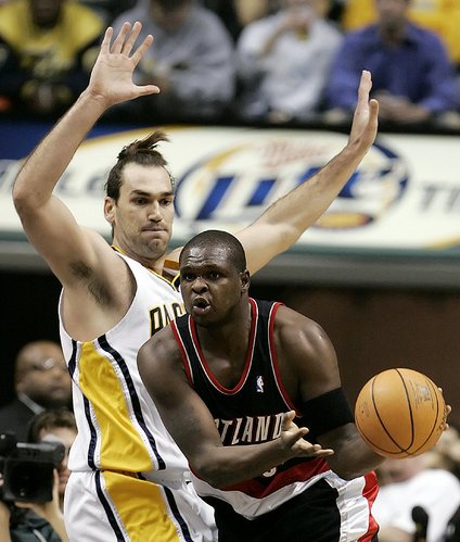 Indiana's Scot Pollard, left, defends Portland's Zach Randolph. Pollard had six points and 16 rebounds in the Pacers' 101-69 victory Wednesday night in Indianapolis.