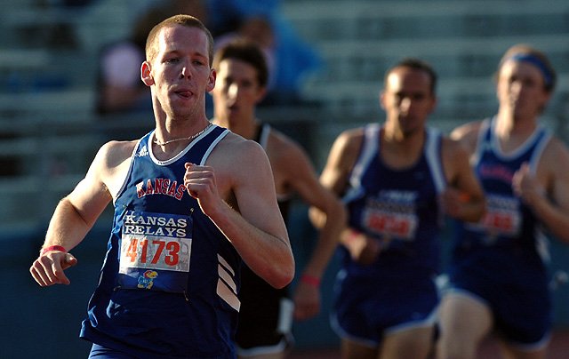 Kansas University's Adrian Ludwig comes around the bend during the men's 1,500-meter run.