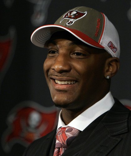 Tampa Bay Buccaneers cornerback Aqib Talib smiles at his introductory news conference. Talib, a former Kansas University All-American, met the media Monday in Tampa, Fla.