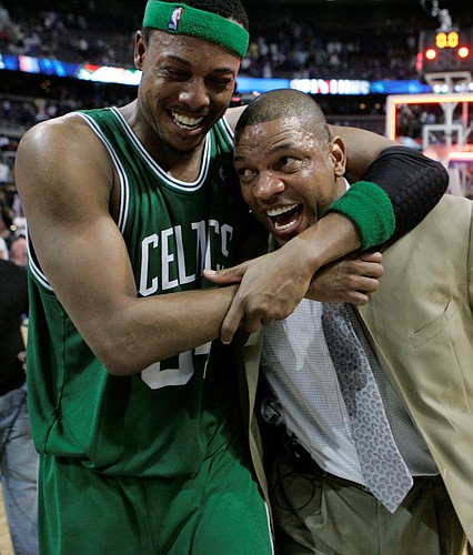 Boston Celtics forward Paul Pierce (34) hugs coach Doc Rivers after the Celtics defeated the Detroit Pistons, 89-81, to win the Eastern Conference finals. The Celtics advanced to the NBA finals with the victory Friday in Auburn Hills, Mich.