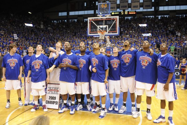 The 2008-09 Kansas men's basketball team checks out the Jumbotron in Allen Fieldhouse after clenching the Big 12 championship with a win over Texas on Saturday, March 7, 2009 at Allen Fieldhouse.