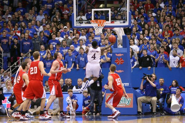 The Fieldhouse crowd watches as Sherron Collins penetrates the Cornell defense for a bucket to give the Jayhawks the lead late in the second half, Wednesday, Jan. 6, 2009 at Allen Fieldhouse.