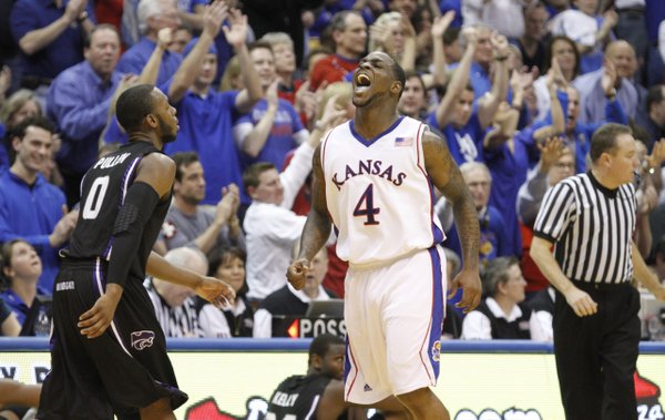 Kansas guard Sherron Collins lets out a celebratory yell as the Jayhawks pull away from rival Kansas State during the second half, Wednesday, March 3, 2010 at Allen Fieldhouse.
