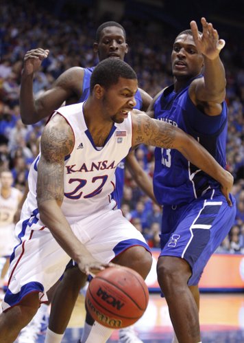 Kansas forward Marcus Morris fights his way out of a trap by Texas A&M-Corpus Christi defenders Justin Reynolds, right, and Horace Bond during the first half, Tuesday, Nov. 23, 2010 at Allen Fieldhouse.