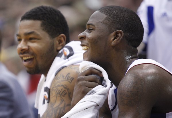 Kansas guard Josh Selby laughs with Markieff Morris on the bench during the second half, Saturday, Dec. 18, 2010 at Allen Fieldhouse.