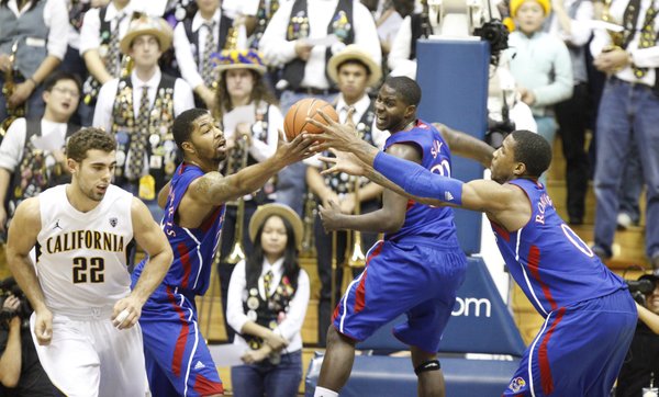 Kansas players Markieff Morris, left, Josh Selby and Thomas Robinson go after a rebound against Cal during the first half, Wednesday, Dec. 22, 2010 at Haas Pavilion in Berkeley, California. At left is Cal forward Harper Kamp.