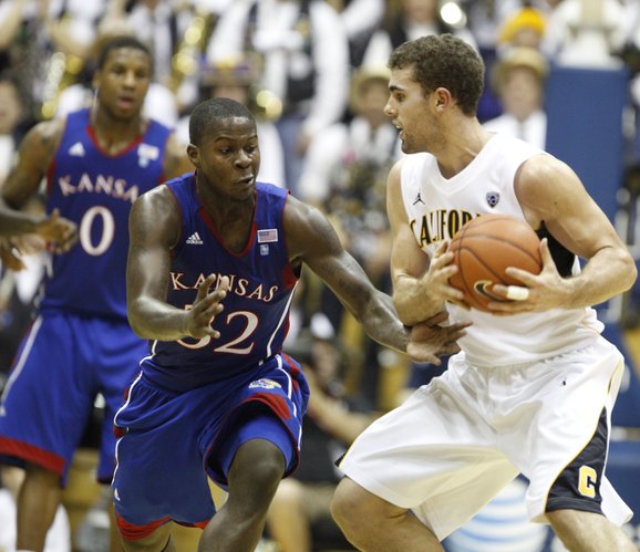 Kansas guard Josh Selby defends Cal forward Harper Kamp during the first half, Wednesday, Dec. 22, 2010 at Haas Pavilion in Berkeley, California.