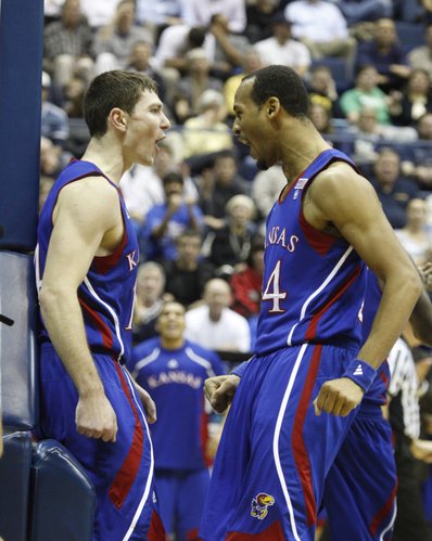 Kansas guard Tyrel Reed celebrates with Travis Releford after grabbing a bucket and a foul from a Cal defender during the second half, Wednesday, Dec. 22, 2010 at Haas Pavilion in Berkeley, California.