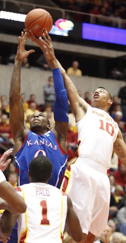 Kansas forward Thomas Robinson goes up for a rebound with Iowa State guard Diante Garrett during the first half on Wednesday, Jan. 12, 2011 at Hilton Coliseum in Ames, Iowa.
