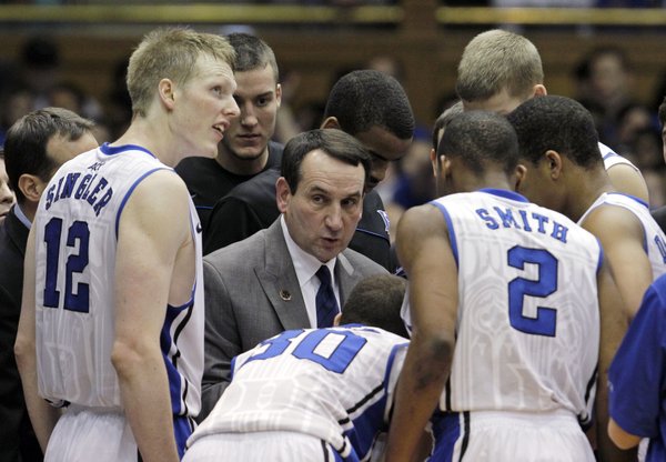 Duke coach Mike Krzyzewski talks with his team during the Blue Devils’ 76-60 victory Jan. 15 against Virginia. Ranked No. 3 in the country but sure to fall after Sunday’s 93-78 loss to St. John’s, Duke is the early betting favorite to win the NCAA championship, but the field is so wide-open, the Devils’ 3/1 odds seem a bit of a stretch.