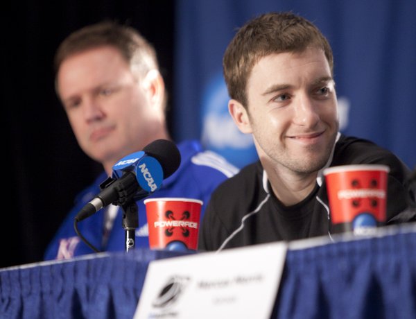 Kansas guard Brady Morningstar smiles during a press conference with his teammates and head coach Bill Self on Saturday, March 26, 2011 at the Alamodome in San Antonio.