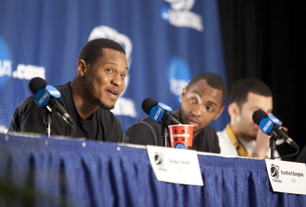 Virginia Commonwealth forward Bradford Burgess answers a question during a press conference on Saturday, March 26, 2011 at the Alamodome in San Antonio.