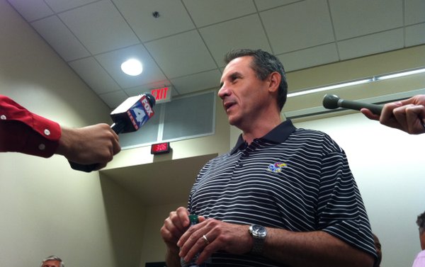 Kansas assistant coach Vic Shealy talks to reporters after being promoted to defensive coordinator on Tuesday, May 31, 2011, at the Anderson Family Football Complex.