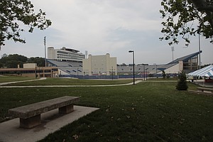 A wide-angle image of KU's football stadium from the Campanile hill leaves a lot of sky in the frame.