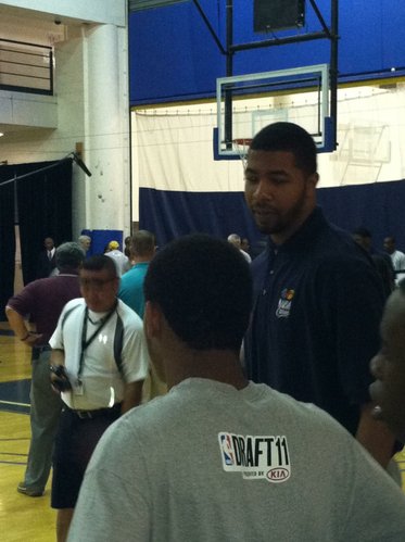 Markieff Morris talks with a participant at an NBA Cares event in New York on Wednesday, June 22, the day before the 2011 NBA draft.
