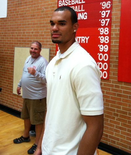 Wichita Heights basketball player Perry Ellis stands after announcing his decision to attend Kansas on Wednesday, Sept. 21, in Wichita.