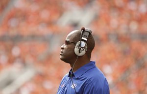 Kansas head coach Turner Gill watches from the sidelines during the second quarter against Oklahoma State on Saturday, Oct. 8, 2011 at Boone Pickens Stadium.