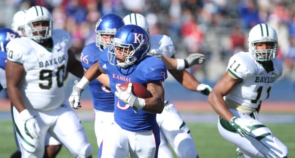 Kansas running back Darrian Miller races up the field for a first down against Baylor during the first quarter on Saturday, Nov. 12, 2011 at Kivisto Field. The run helped put the Jayhawks in field goal range.