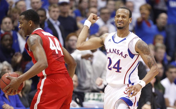 Kansas guard Travis Releford pumps his fist after forcing Ohio State guard William Buford to turn it over in the first half Saturday, Dec. 10, 2011 at Allen Fieldhouse.