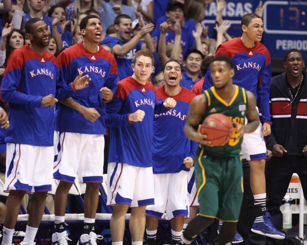 The Kansas bench goes wild during a Jayhawk run in the second half on Monday, Jan. 16, 2012 at Allen Fieldhouse.