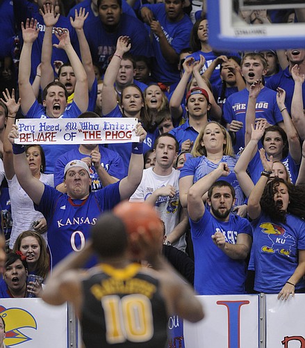 KU fans try to disrupt a free-throw attempt by the Tiger's Ricardo Ratliffein the Jayhawks win against the Missouri Tigers, Saturday, Feb 25, 2012..