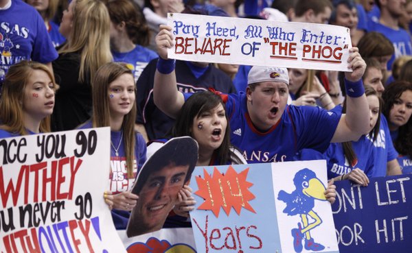 Kansas University students Vanessa Phillips, Wichita senior, and Josh Deboer, Overland Park senior, scowl at the Missouri players as they take the court  prior to tipoff on Saturday, Feb. 25, 2012 at Allen Fieldhouse.