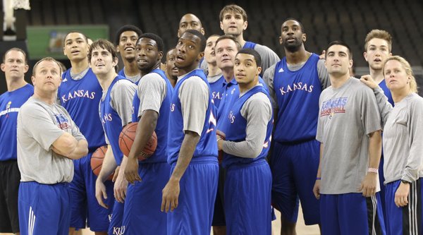 Kansas players, coaches and staff watch a half-court shot to end practice at the Superdome on Friday, March 30, 2012.
