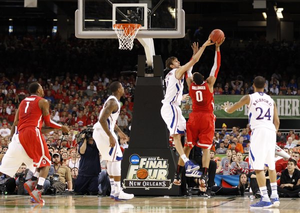 Kansas center Jeff Withey blocks a shot by Ohio State forward Jared Sullinger during the second half on Saturday, March 31, 2012 at the Superdome.