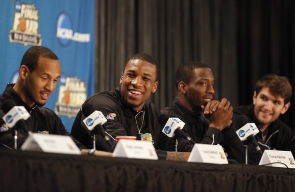 Kansas forward Thomas Robinson, second from left, smiles as he and teammates Travis Releford, left, Tyshawn Taylor and Jeff Withey respond to questions during a press conference on Sunday, April 1, 2012 at the Superdome.