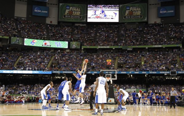 Kansas center Jeff Withey and Kentucky forward Anthony Davis go up for the opening tipoff of the national championship on Monday, April 2, 2012 in New Orleans.
