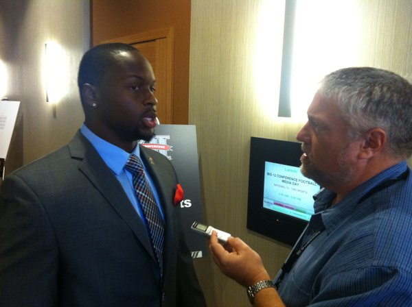 Kansas defensive end Toben Opurum talks to a reporter on Big 12 media days on Tuesday in Dallas.