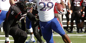 Kansas running back James Sims runs for a touchdown in the first half of KU's game against the Northern Illinois Huskies on Saturday at Huskie Stadium in DeKalb, Ill.