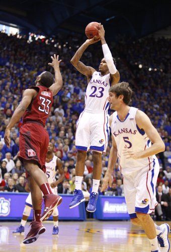 Kansas guard Ben McLemore pulls up for a three over Temple guard Scootie Randall during the first half on Sunday, Jan. 6, 2013 at Allen Fieldhouse.