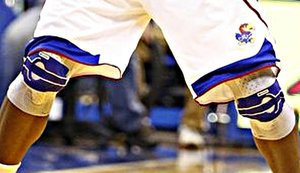 Close Up of EJ's Knees in the OU Game. Photo by Nick Krug/cropping and enlargement by jaybate