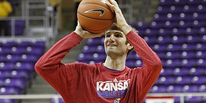 Kansas center Jeff Withey participates in the Jayhawks' shoot-around before KU's game against Texas Christian on Wednesday at TCU in Fort Worth, Texas.