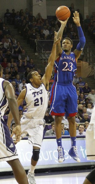 Kansas guard Ben McLemore gets fouled on a shot by TCU's Nate Butler Lind (21) in the Jayhawks' game Wednesday at TCU in Fort Worth, Texas.