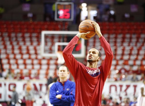 Kansas guard Travis Releford warms up prior to tipoff against Oklahoma on Saturday, Feb. 9, 2013 at Noble Center in Norman, Oklahoma.