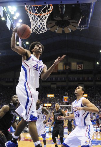 Kansas forward Kevin Young gets a rebound against Kansas State during the first half on Monday February 11, 2013 in Allen Fieldhouse.